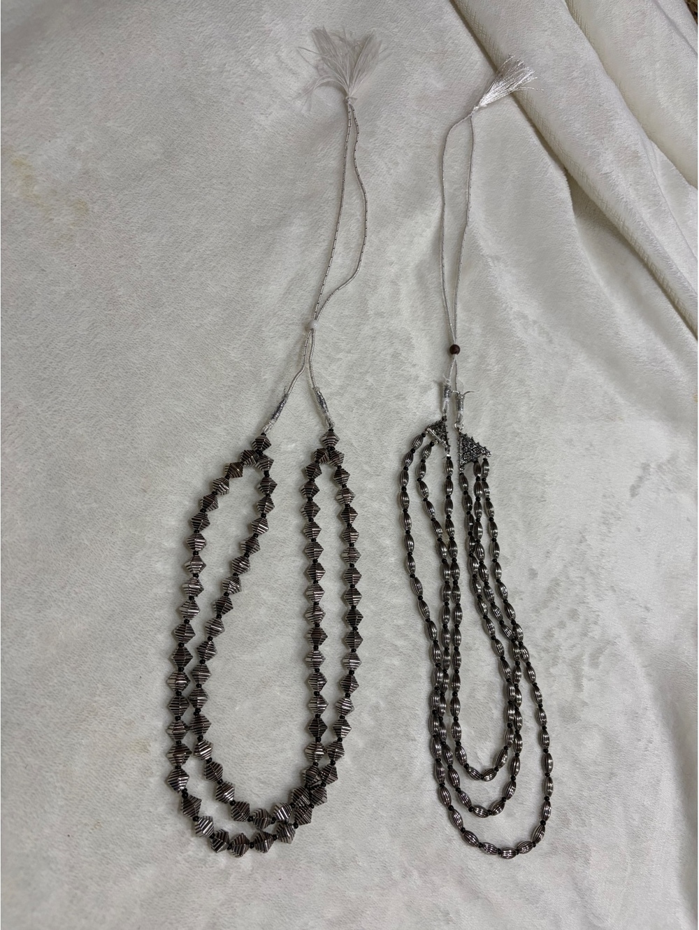 Lot of 2 multi-strand silver-toned necklaces geometric shapes torpedo oval